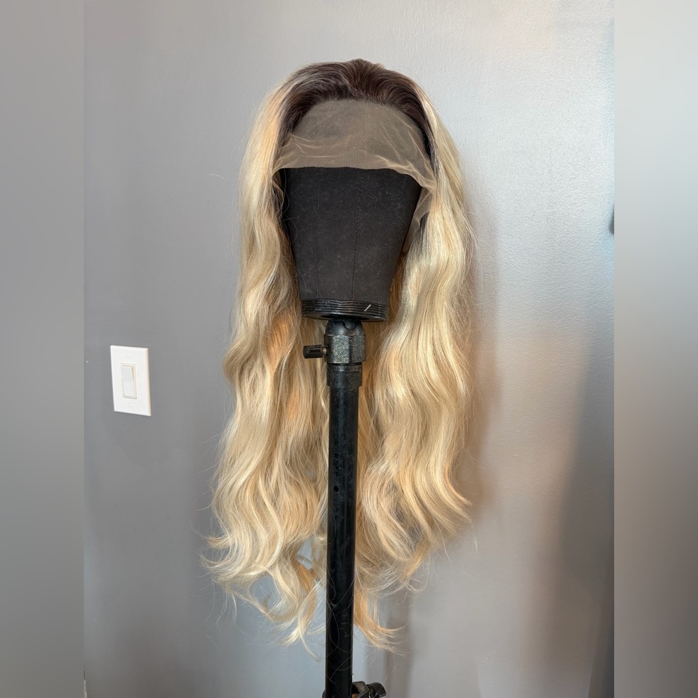 Brand new 13x2.5 blonde synthetic wig with brown shadow root. 26 inches